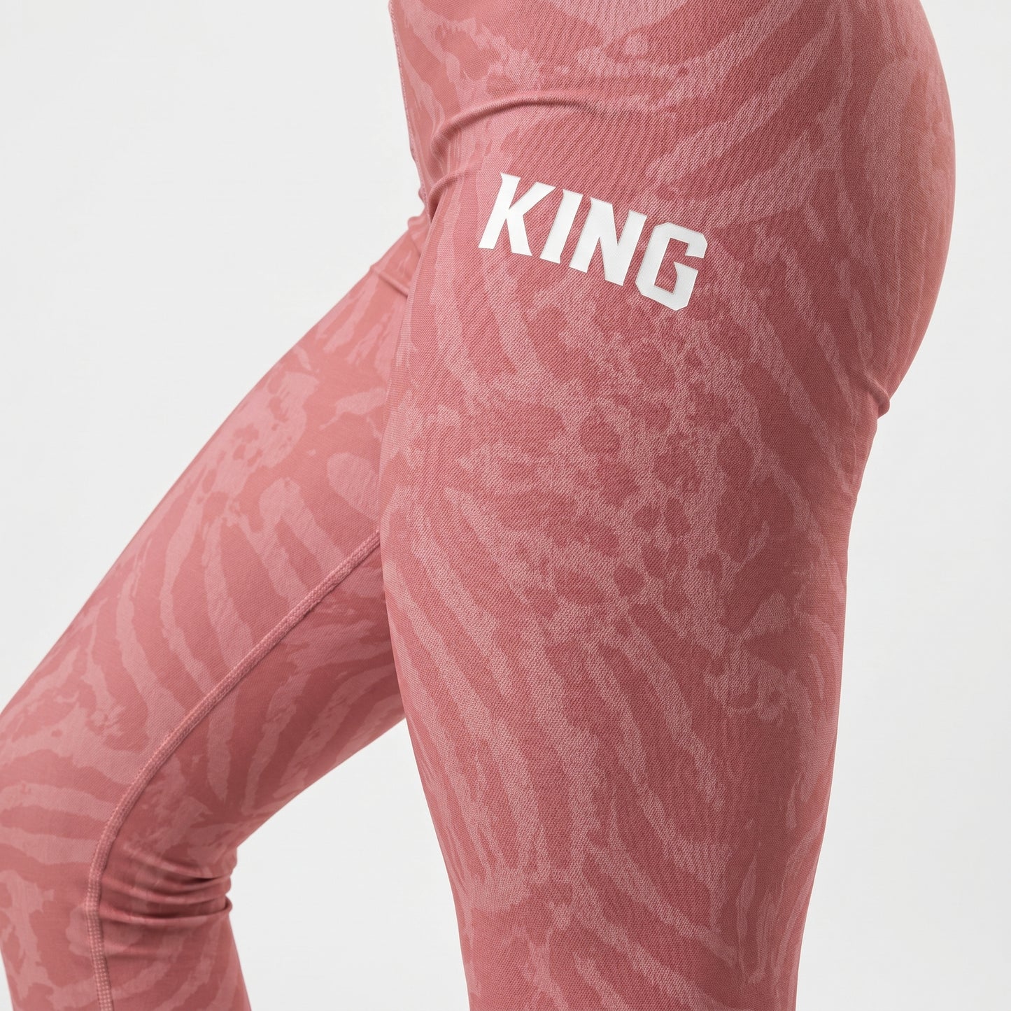 Minimal luxury women’s fitness leggings in dusty rose with second-skin fit