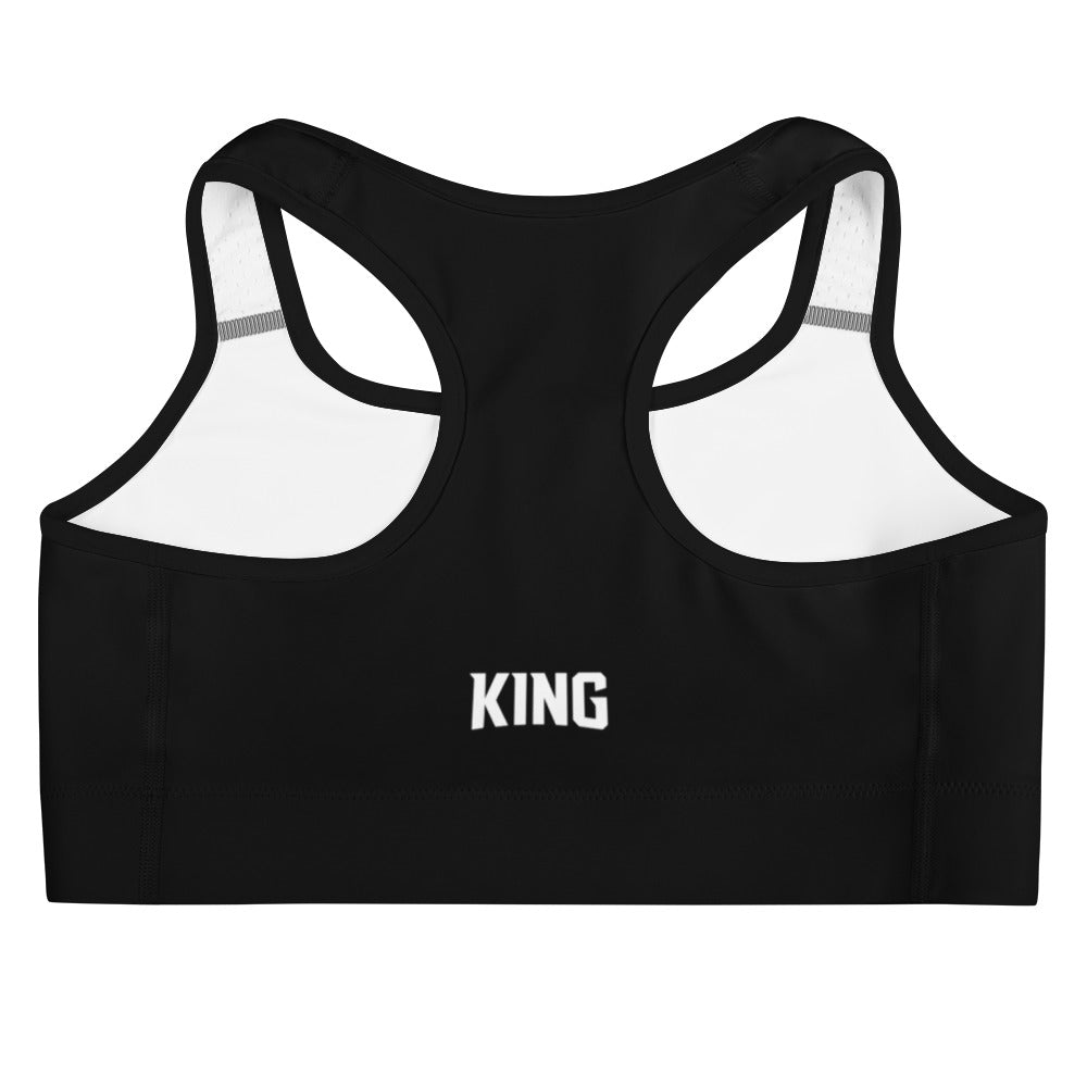 Flat product mockup of black KING Lioness sports bra – back view with KING text logo.