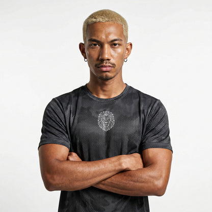 Male model wearing KING APEX iron grey camo performance tee with geometric lion logo front view