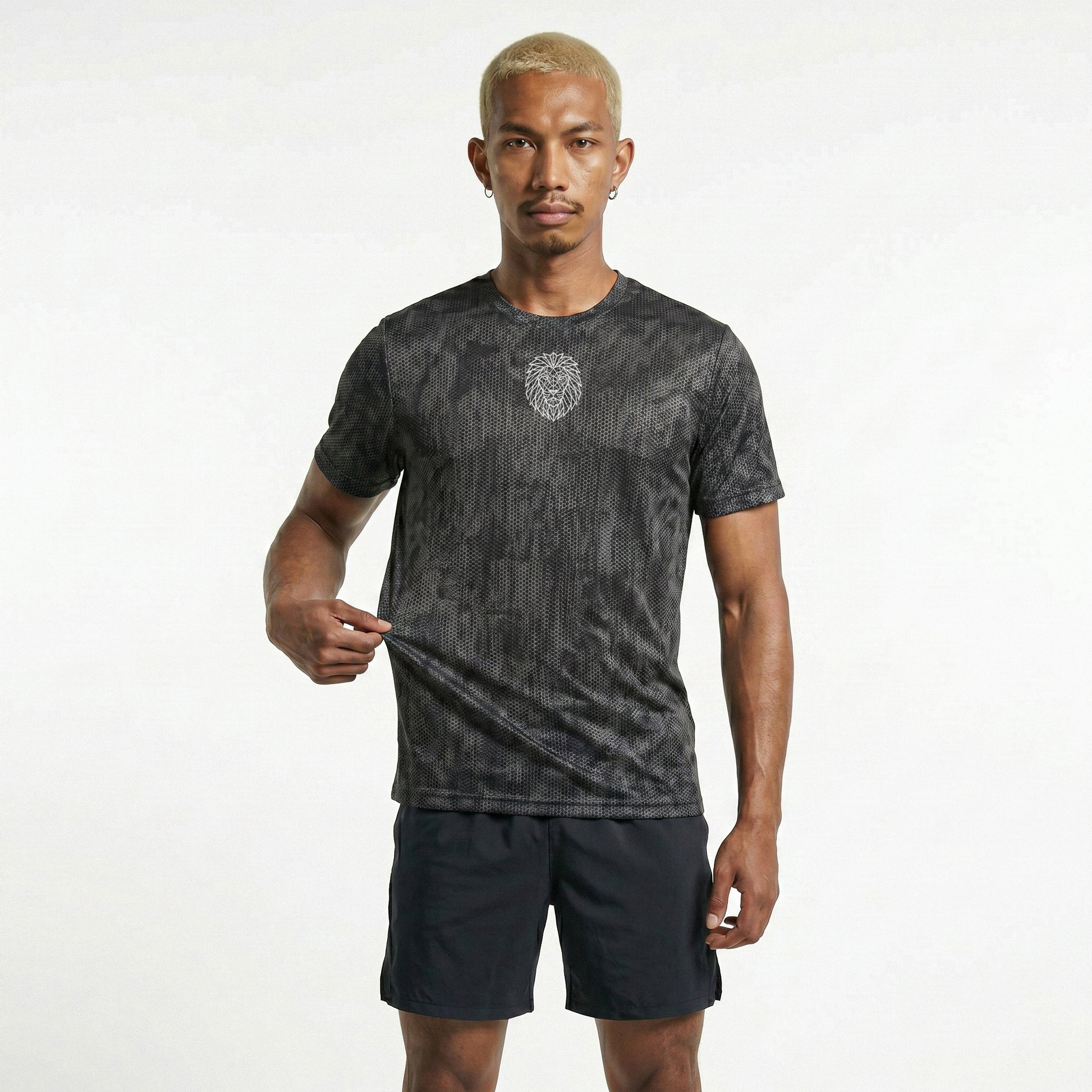 Full body view of KING APEX iron grey athletic performance outfit with camo hex texture