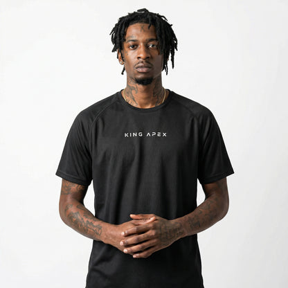 KING APEX Core Sports Jersey Black – Man with a minimal athletic performance t-shirt front view.