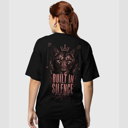 model wearing KING APEX lioness oversized black t-shirt with Built in Silence rose lioness design