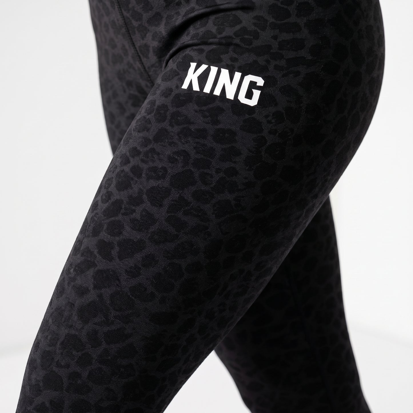 Close-up of premium black texture on KING APEX leggings