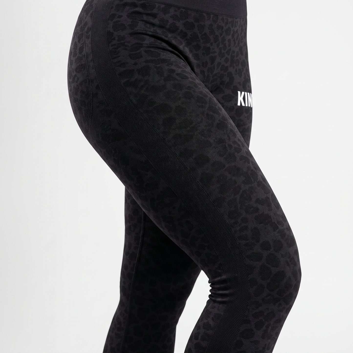 Close-up of premium black texture on KING APEX leggings