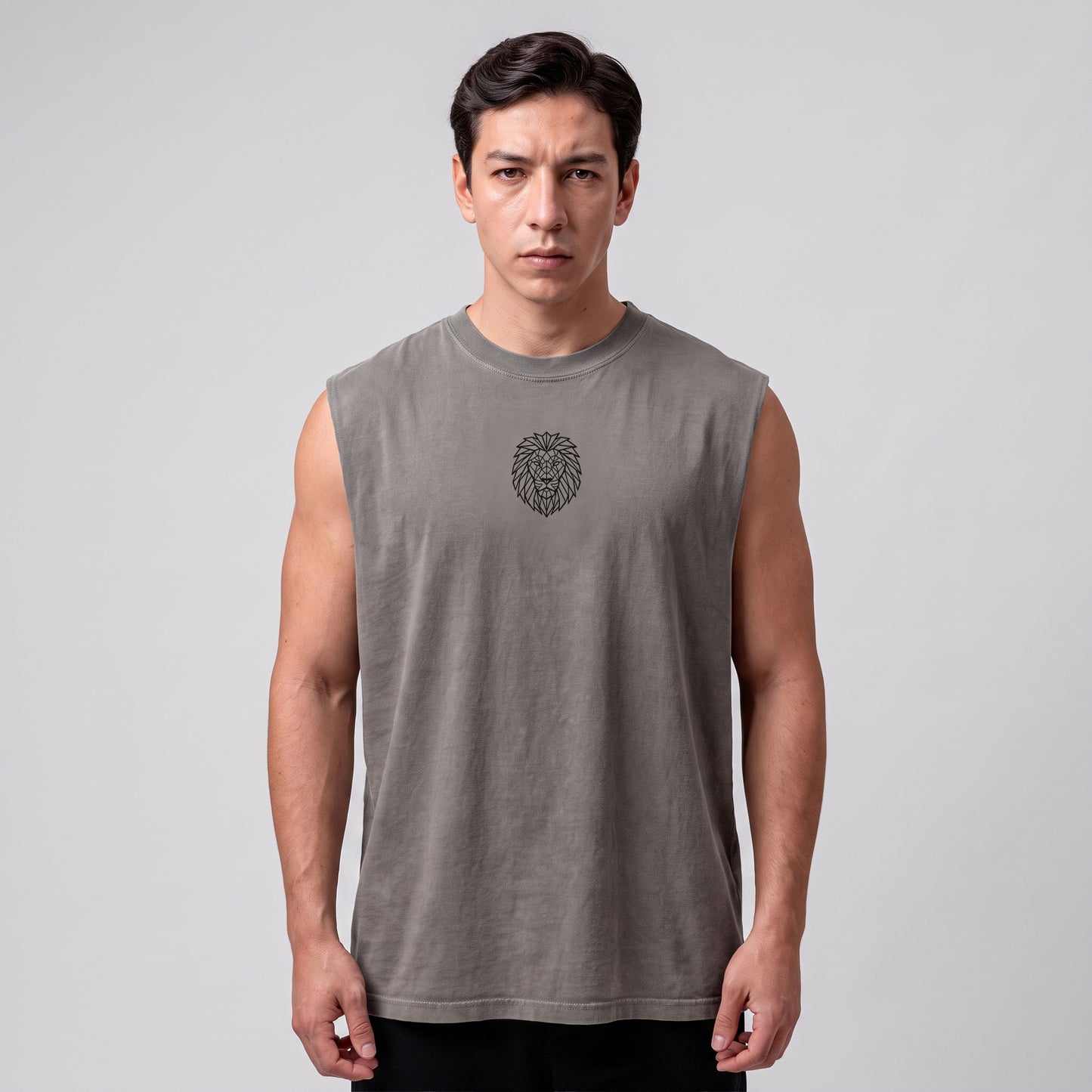 Male model wearing the KING APEX Men's Heavy Faded Tank in Stone Grey, front view.