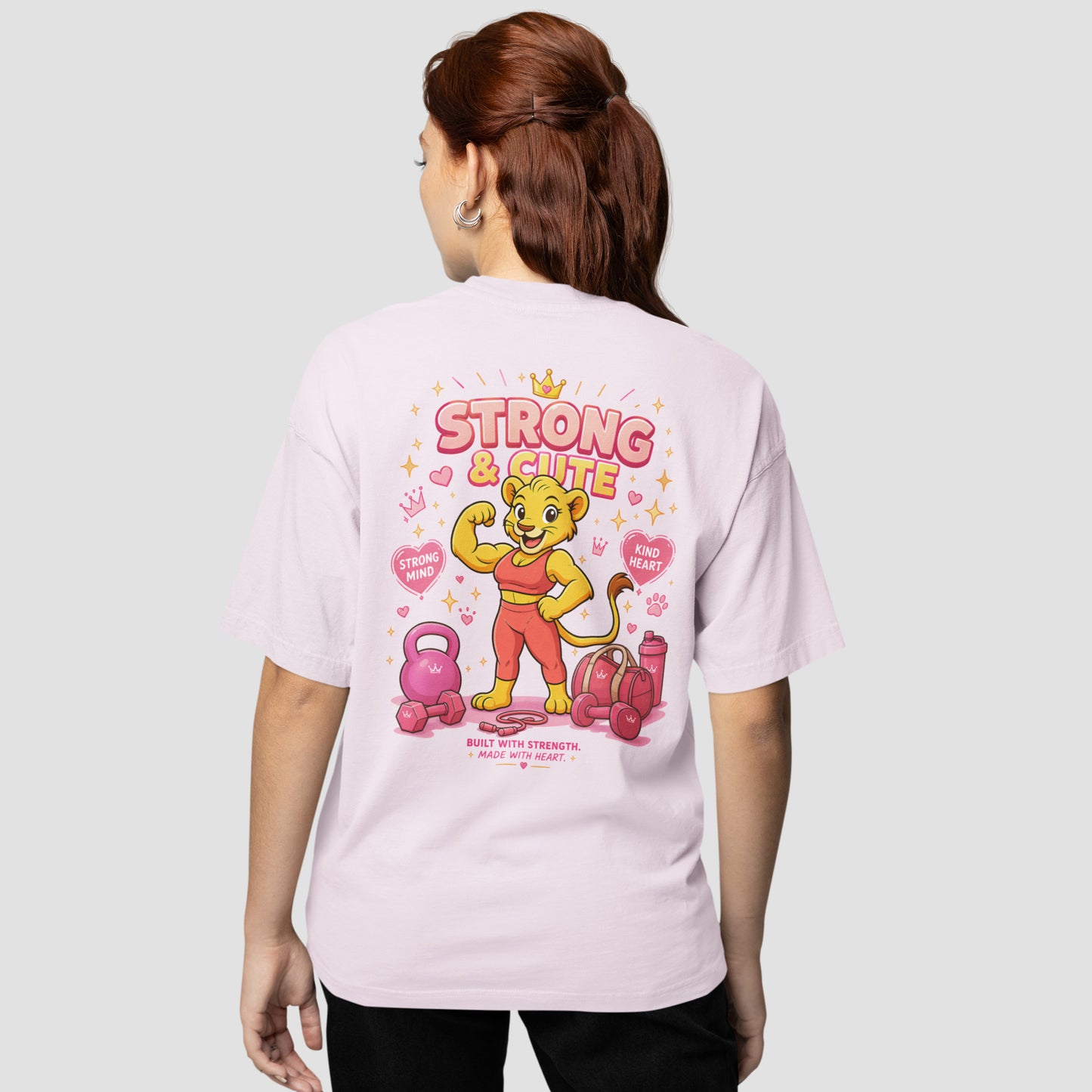 model wearing KING APEX oversized pink t-shirt Strong and Cute design