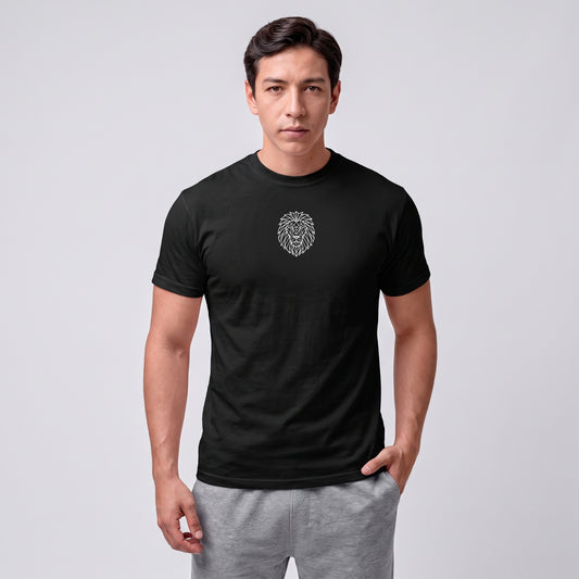 Model wearing the black KING APEX Sports Tee with a geometric lion emblem on the chest, front view.