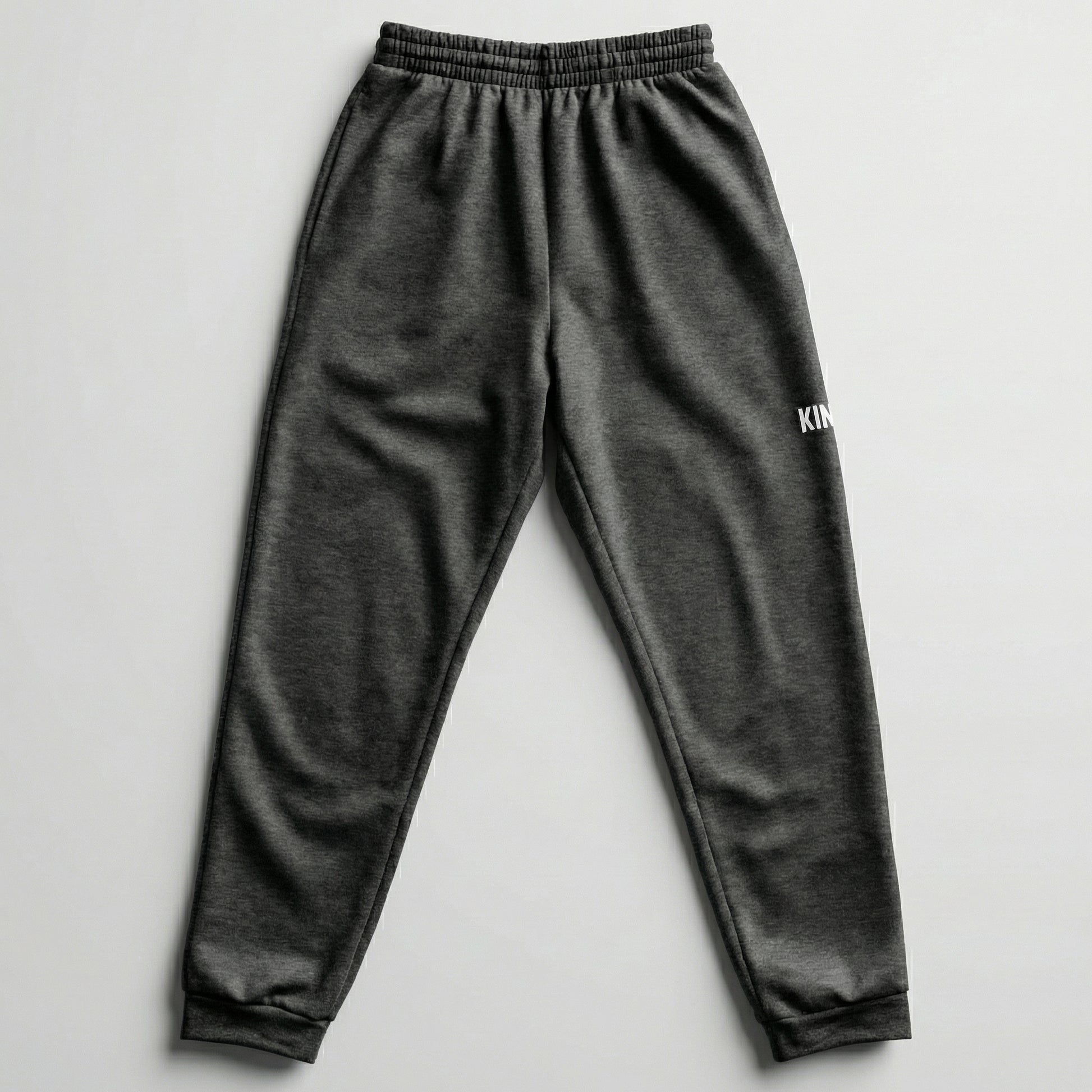 Flat lay back view of KING joggers showing waistband and structure