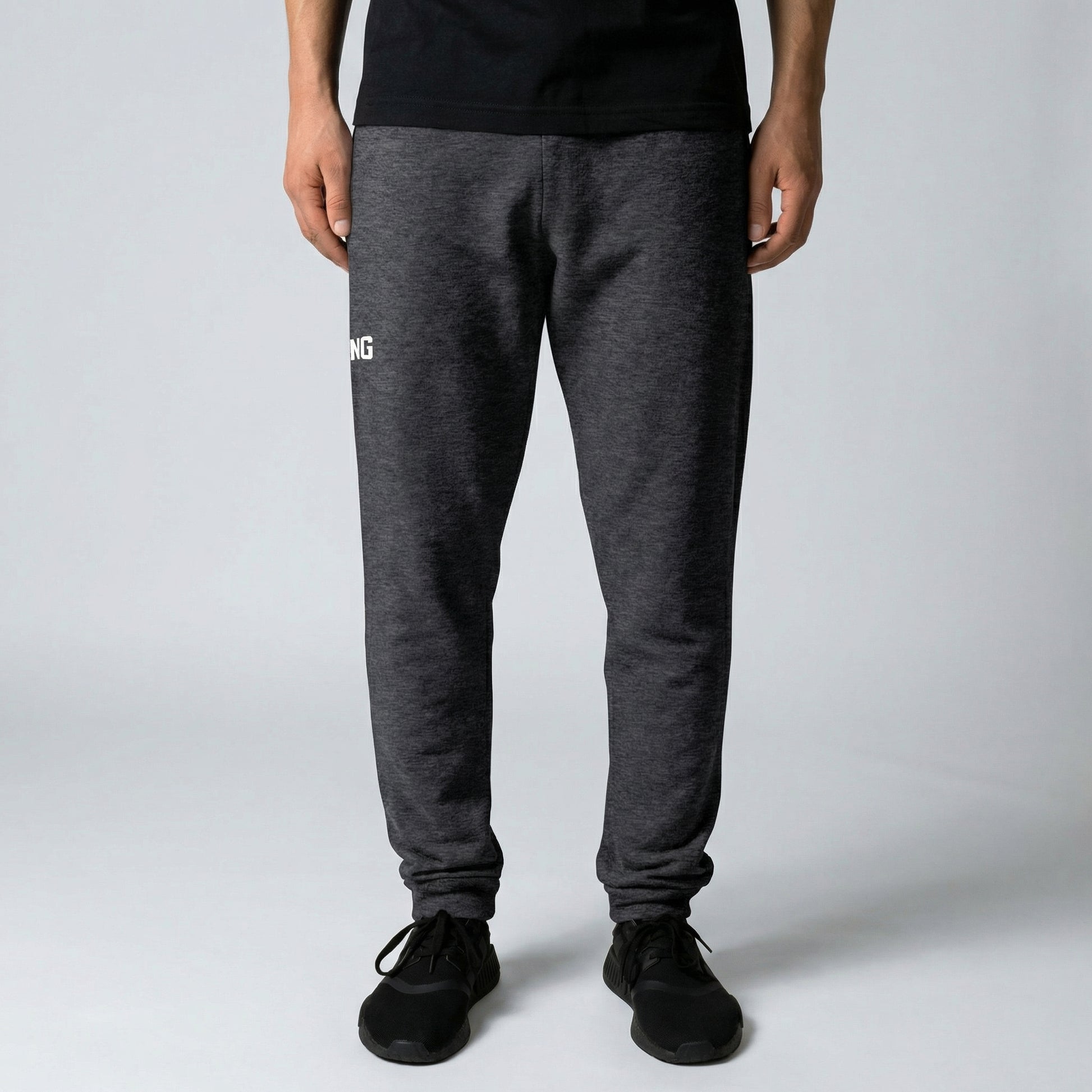 KING Essential Joggers Dark Heather front view on model with minimal logo