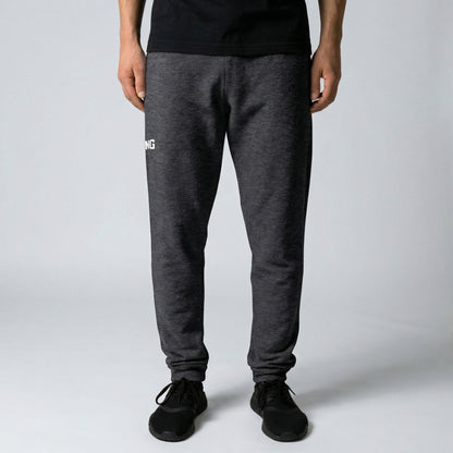 KING Essential Joggers Dark Heather front view on model with minimal logo
