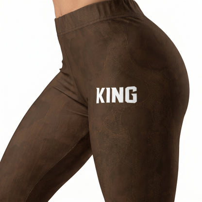 Close-up detail of KING Lioness Earth Shadow Leggings featuring the premium brown texture and signature KING logo.