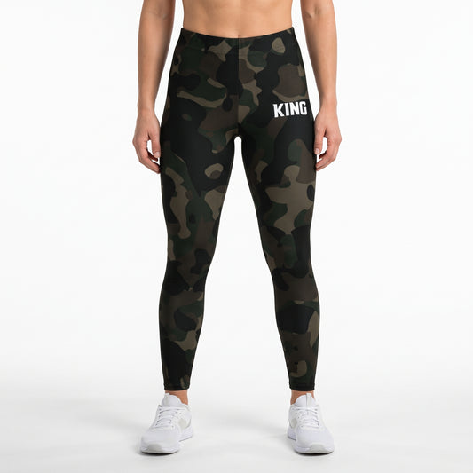 Front view of a model wearing KING APEX Lioness Jungle military camo high-waisted gym leggings.