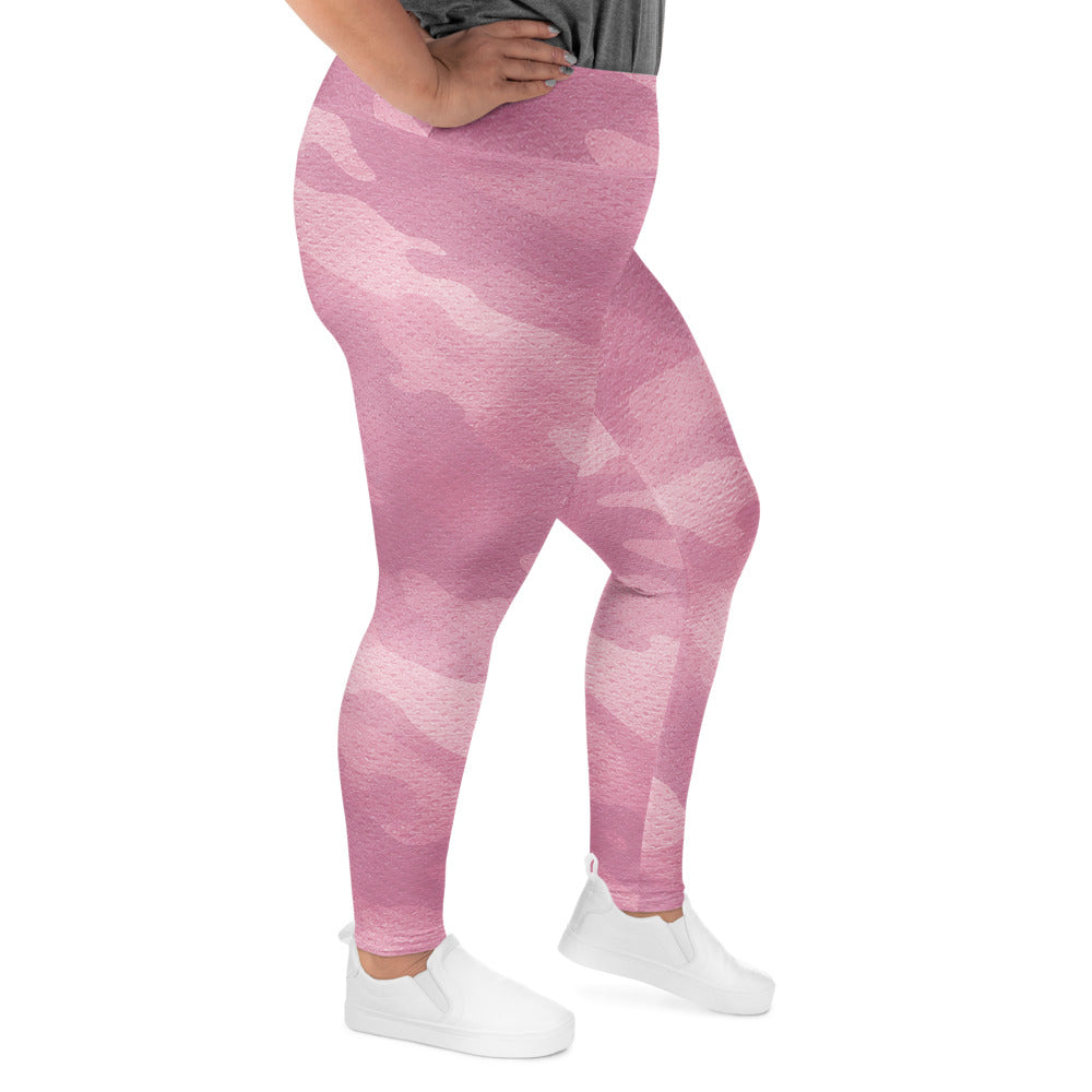 Angled view of rose camo plus size leggings with flexible athletic fit
