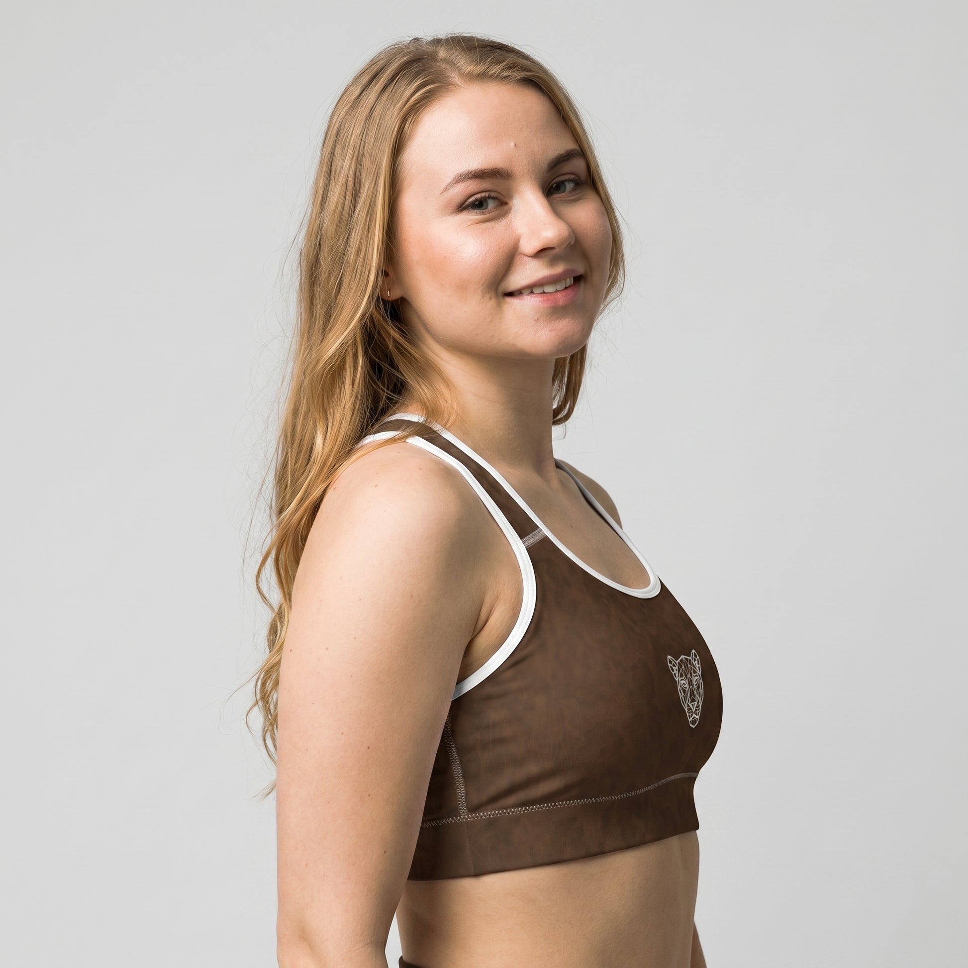 Angled view of the KING Lioness Savannah Pattern Sports Bra featuring the Savannah Pattern texture.