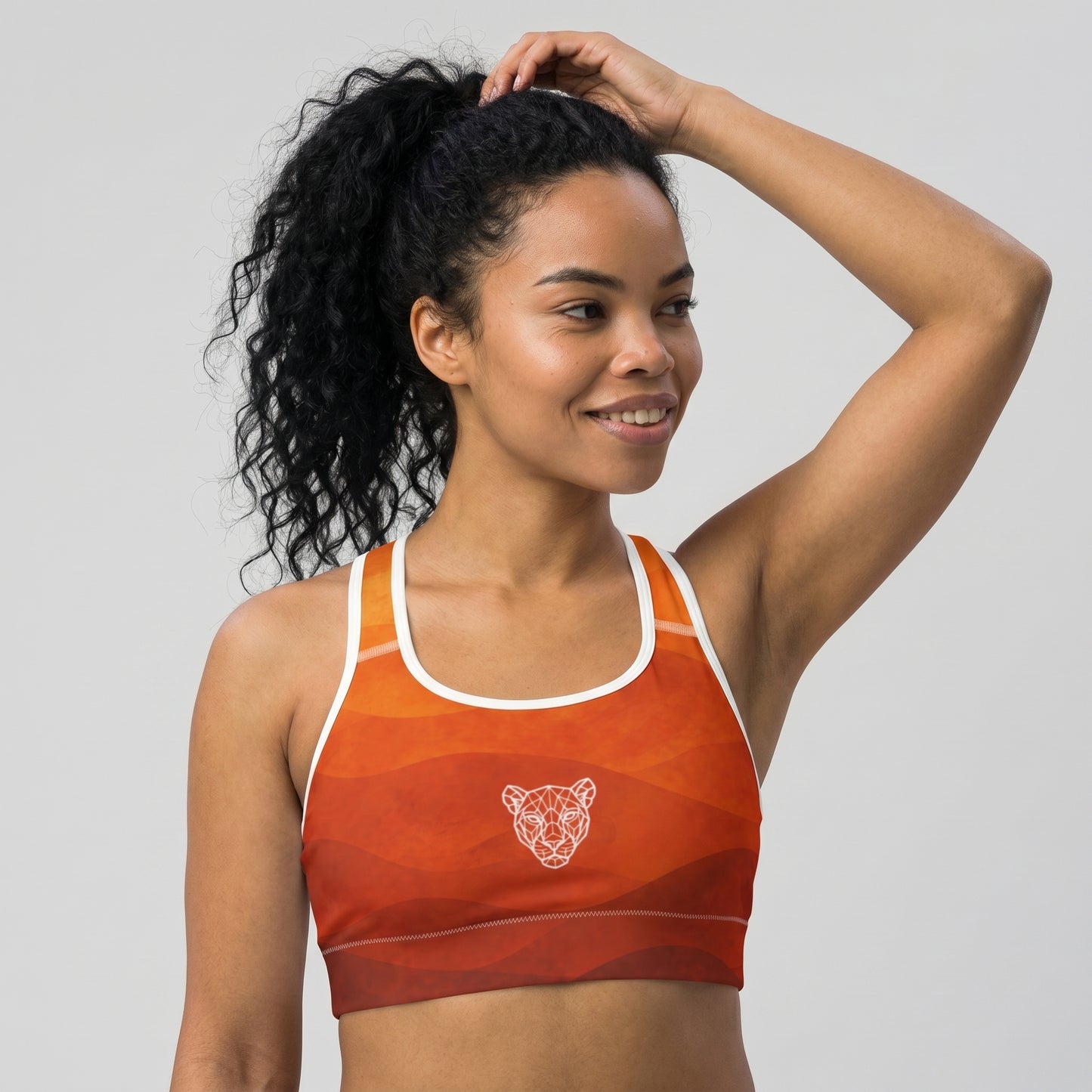 Side profile of KING Lioness Savannah Sports Bra Earth Edition women's activewear