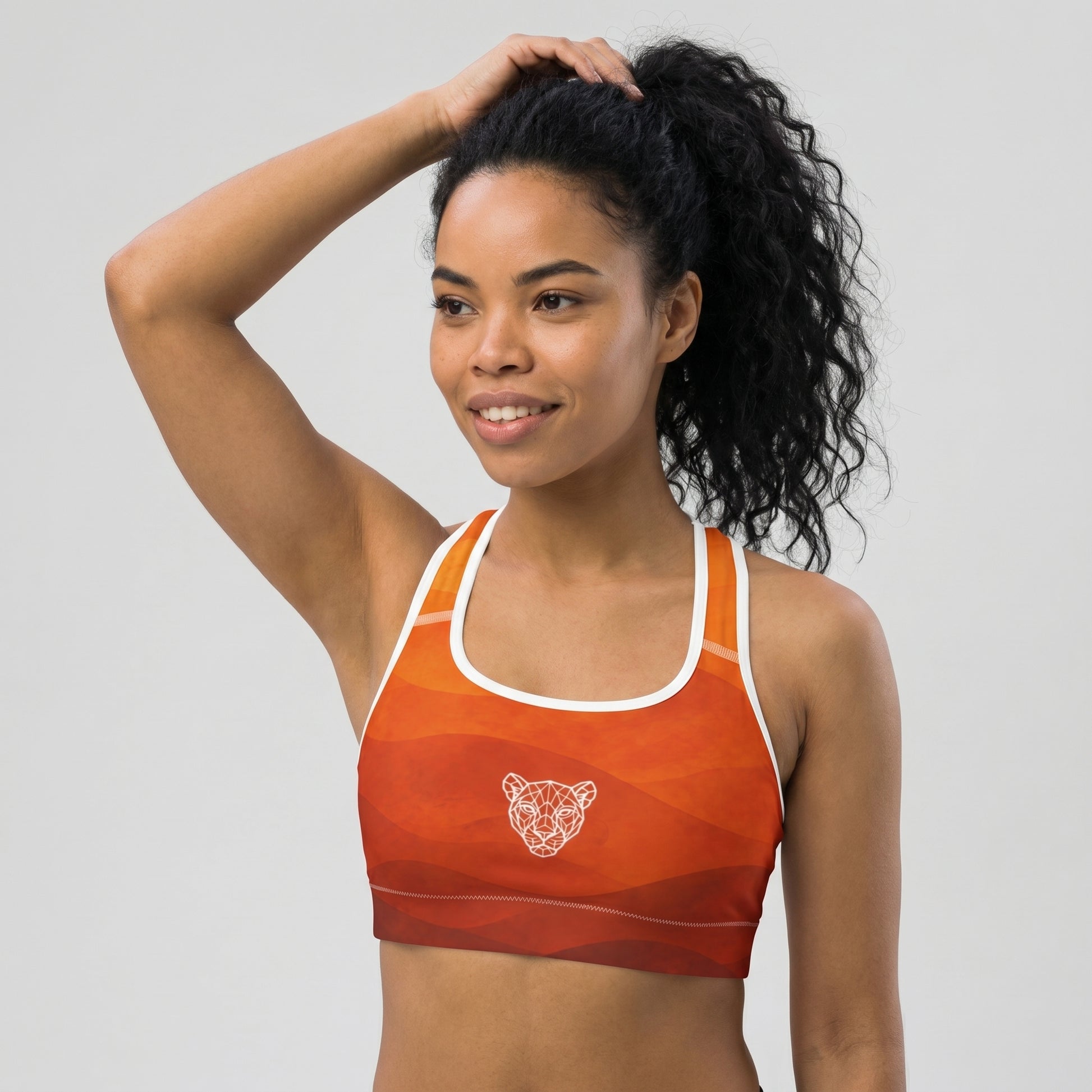 Side profile of KING Lioness Savannah Sports Bra Earth Edition women's activewear