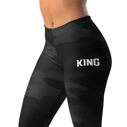 Close-up of KING logo on Lioness shadow camo performance leggings