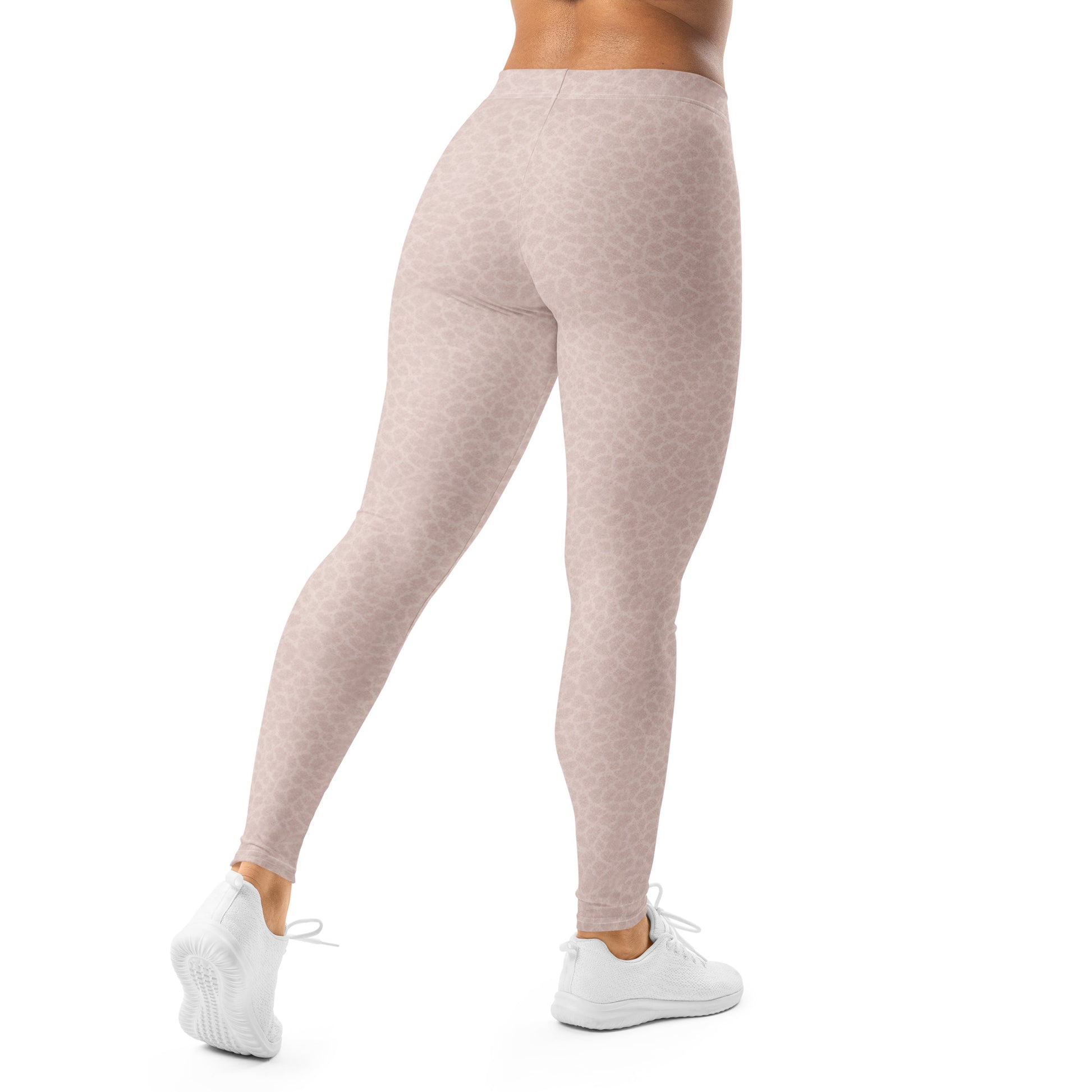 Back view of KING Lioness rose shadow camo leggings on model