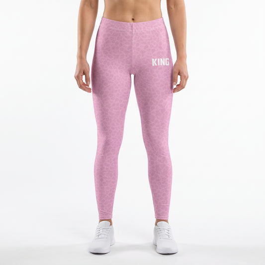 Front view of a model wearing KING APEX Lioness Soft Rose shadow pattern high-waisted gym leggings.