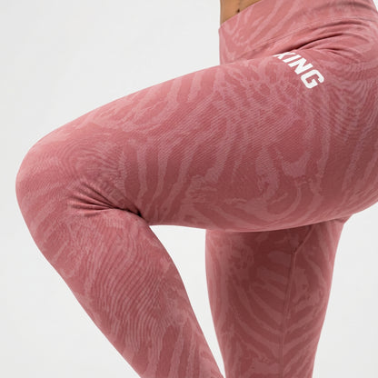 Front standing view of premium soft rose performance leggings by KING APEX