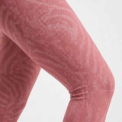 Detailed texture close-up of soft rose shadow pattern activewear leggings