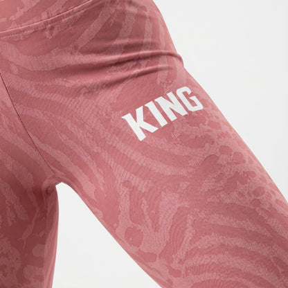 Detailed texture close-up of soft rose shadow pattern activewear leggings