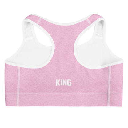 Back view of KING Lioness sports bra showing racerback design in rose textured fabric