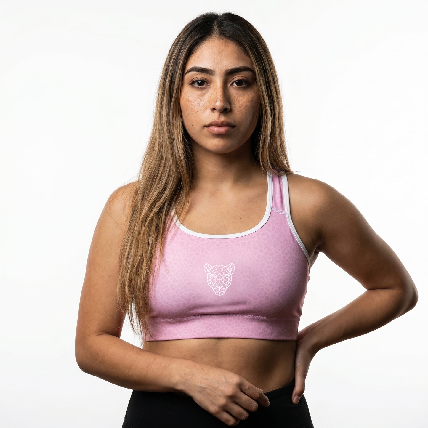Side view of KING Lioness rose textured sports bra showing fit and silhouette