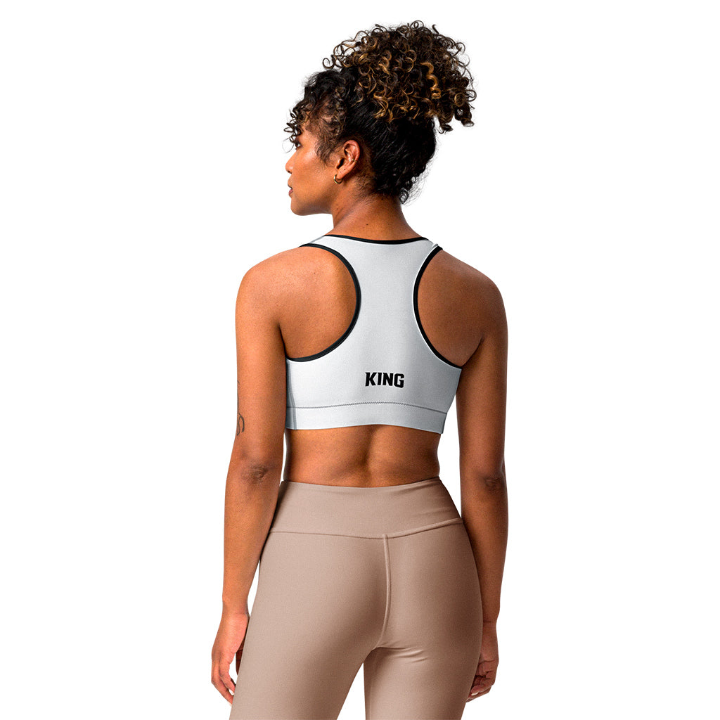 White KING Lioness sports bra with black piping – back view showing KING logo.