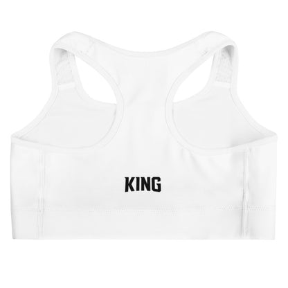 Flat product mockup of white KING Lioness sports bra – back view with KING text logo.
