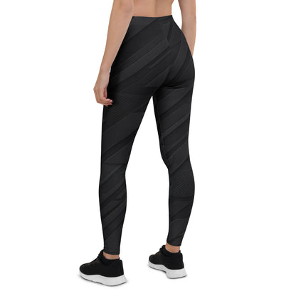 Back view of KING Lioness Tactical Apex Leggings — Black Edition highlighting high-rise waistband and tactical pattern.