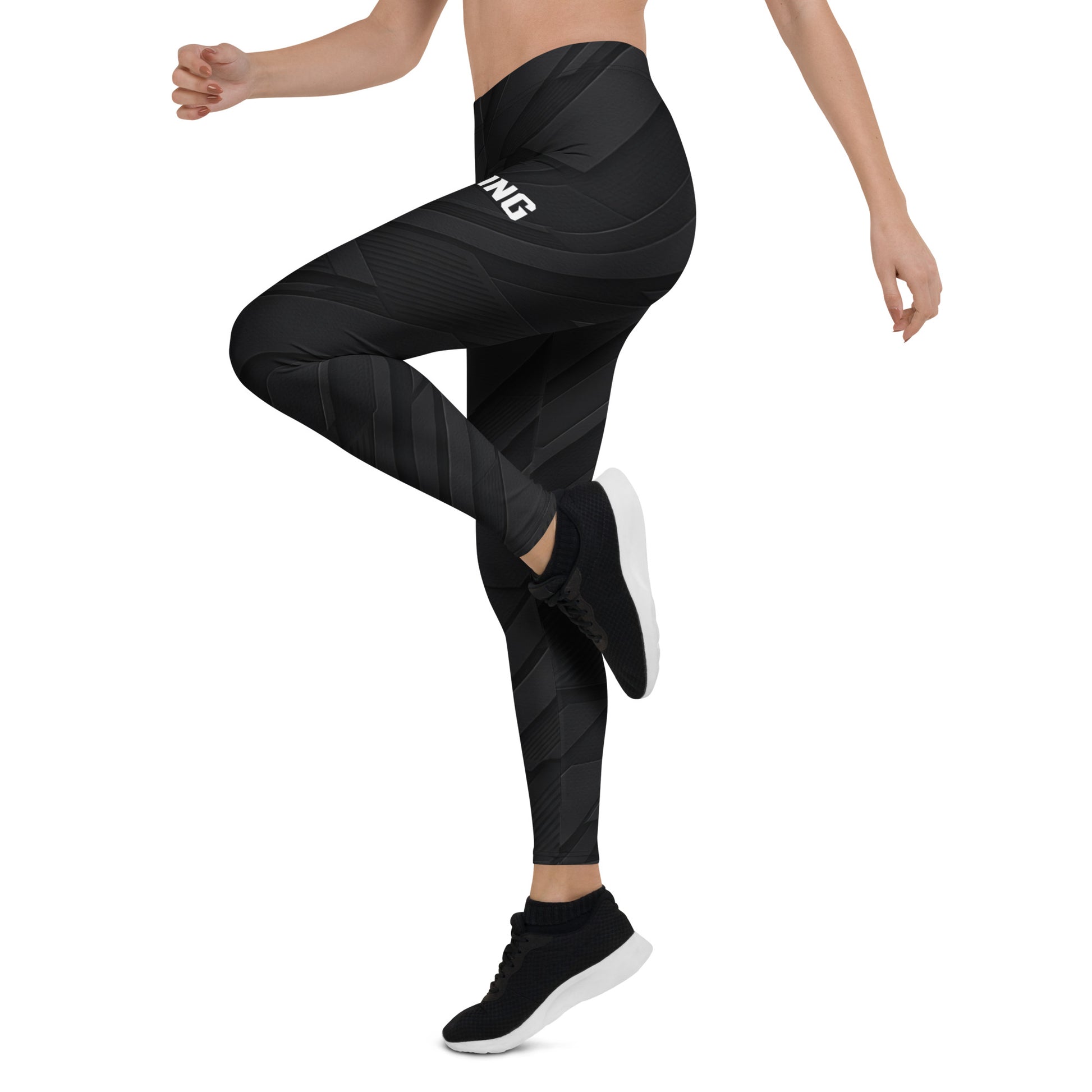 Action pose of KING Lioness Tactical Apex Leggings — Black Edition demonstrating flexibility and performance fit.