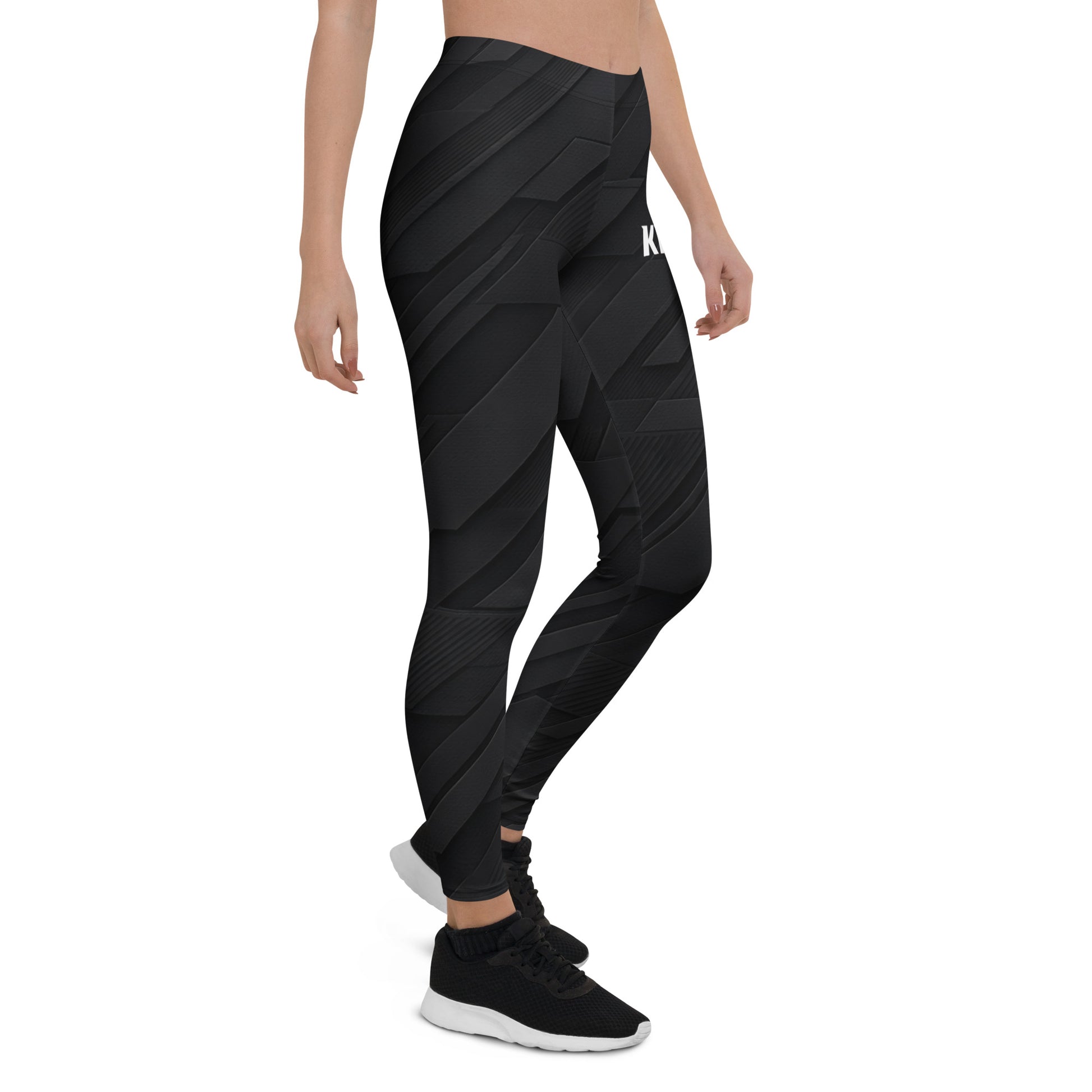 Side view of KING Lioness Tactical Apex Leggings — Black Edition showing four-way stretch and sculpted fit.