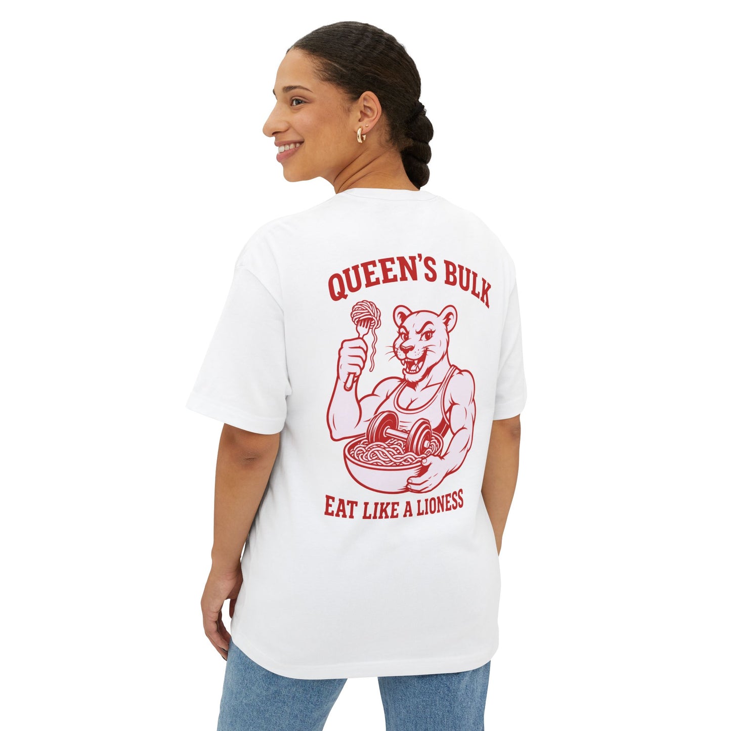 Female model wearing the KING Oversized Tee — White (Queen’s Bulk Edition) with bold lioness bulk graphic in red print on the back.