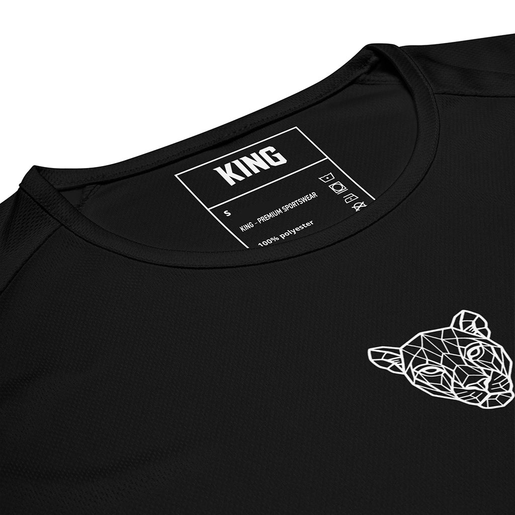 Close-up of the KING Black Sports Jersey collar, tag, and geometric lioness emblem.