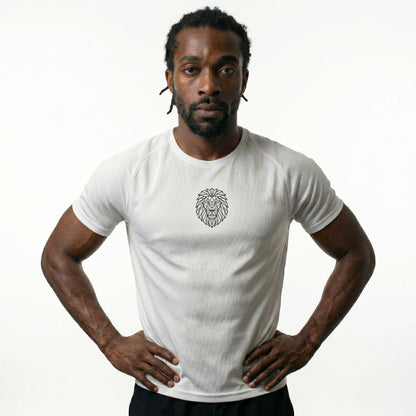 Male model wearing the KING white sports jersey with geometric lion chest emblem — front view.