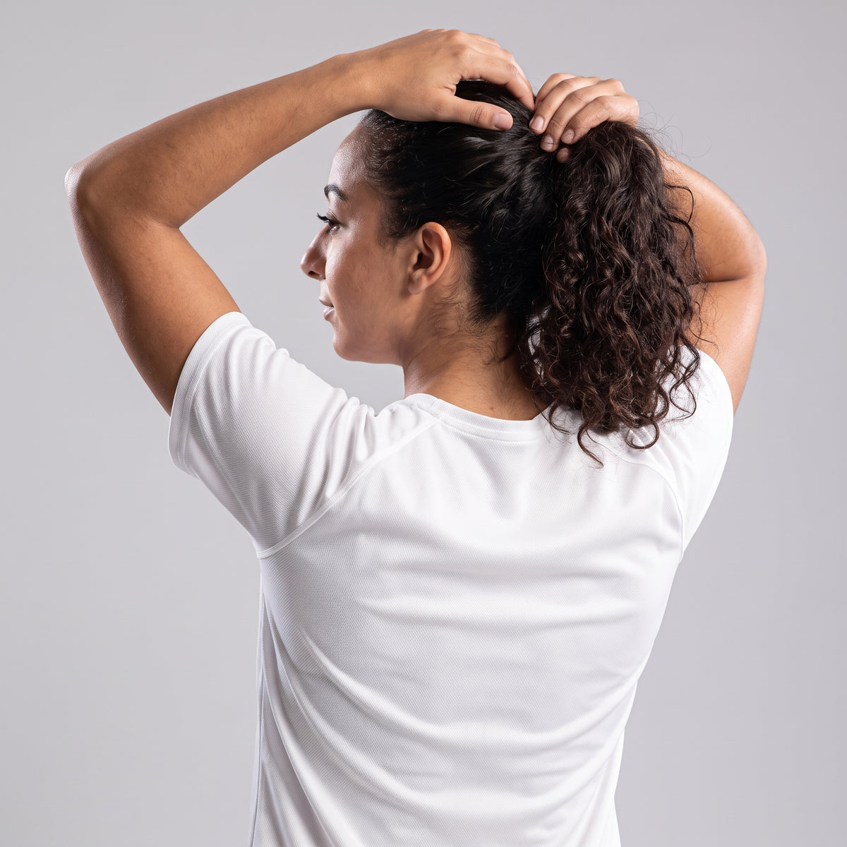 Close-up back view of white KING Sports Jersey showing geometric lioness design
