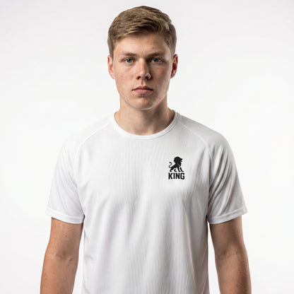 White KING sports jersey with minimal lion chest emblem – model front view.