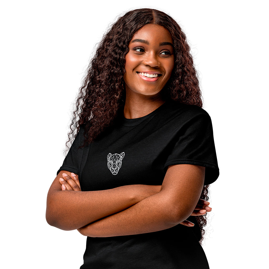 Black KING sports tee with geometric lioness emblem — female model front view.