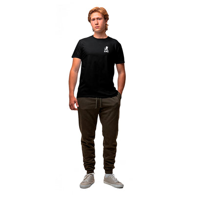 Black KING sports tee with minimal lion emblem – full-body front view.