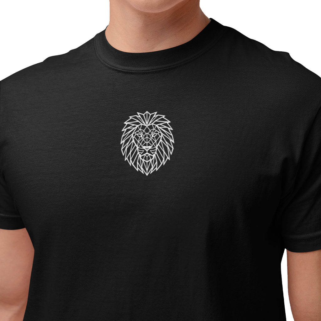 Close-up of geometric lion emblem on black KING sports tee.