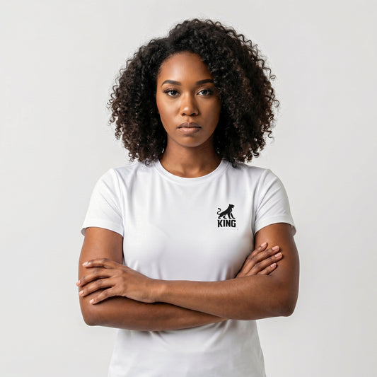 KING Sports Tee White Minimal Lioness — female model front view with crossed arms wearing minimal athletic t-shirt