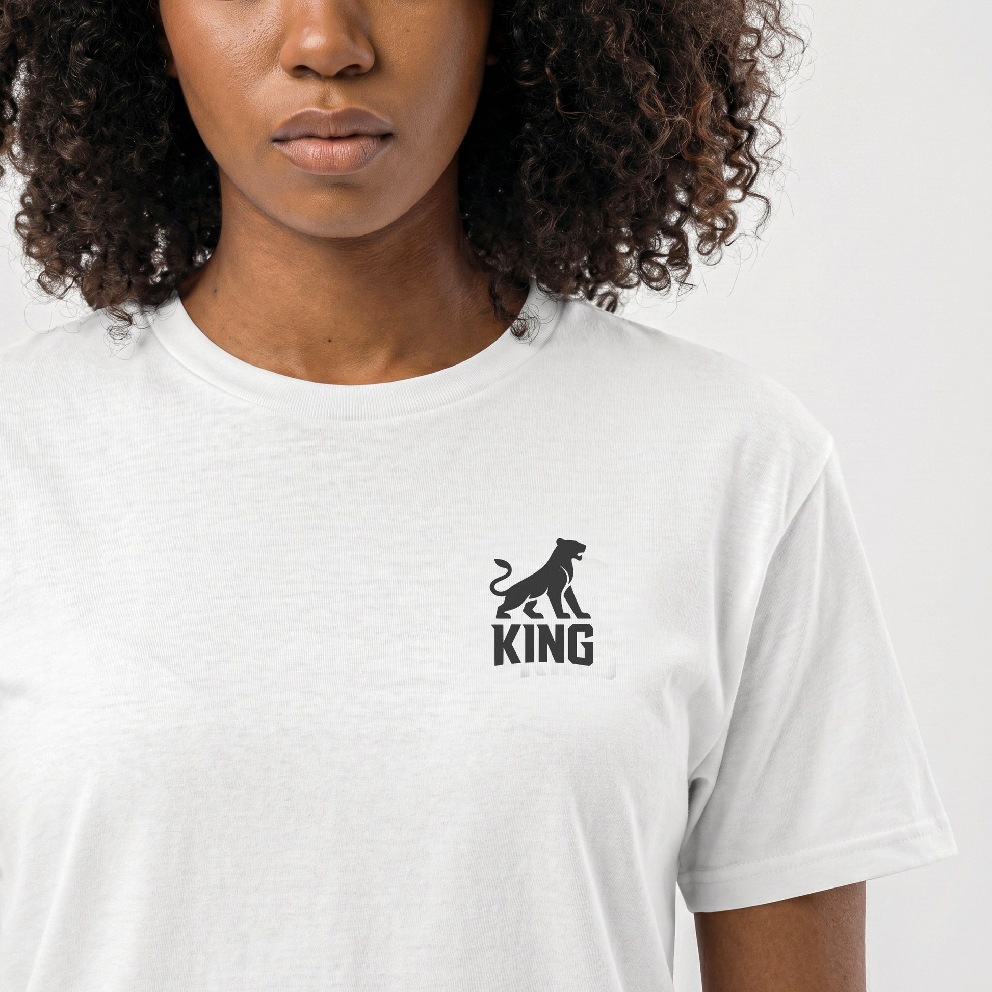 KING Sports Tee White Minimal Lioness — close-up of chest logo on premium white athletic t-shirt