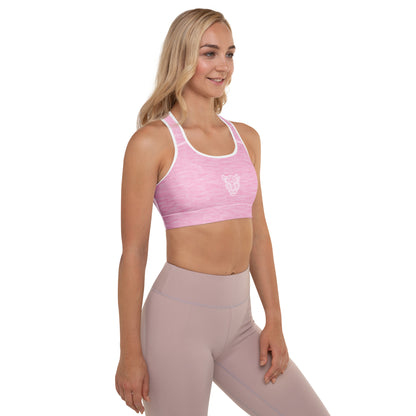 Side view of Lioness pink padded sports bra on female model, supportive athletic fit by KING APEX
