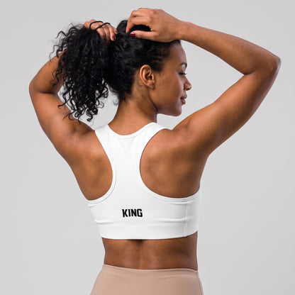 Back view of the KING Lioness Sports Bra in black on a female model.